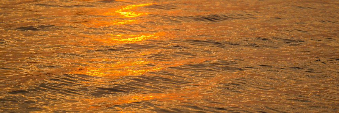 Reflections of the sun on the ocean